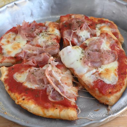 Gluten-free pizza with mozzarella and cooked ham
