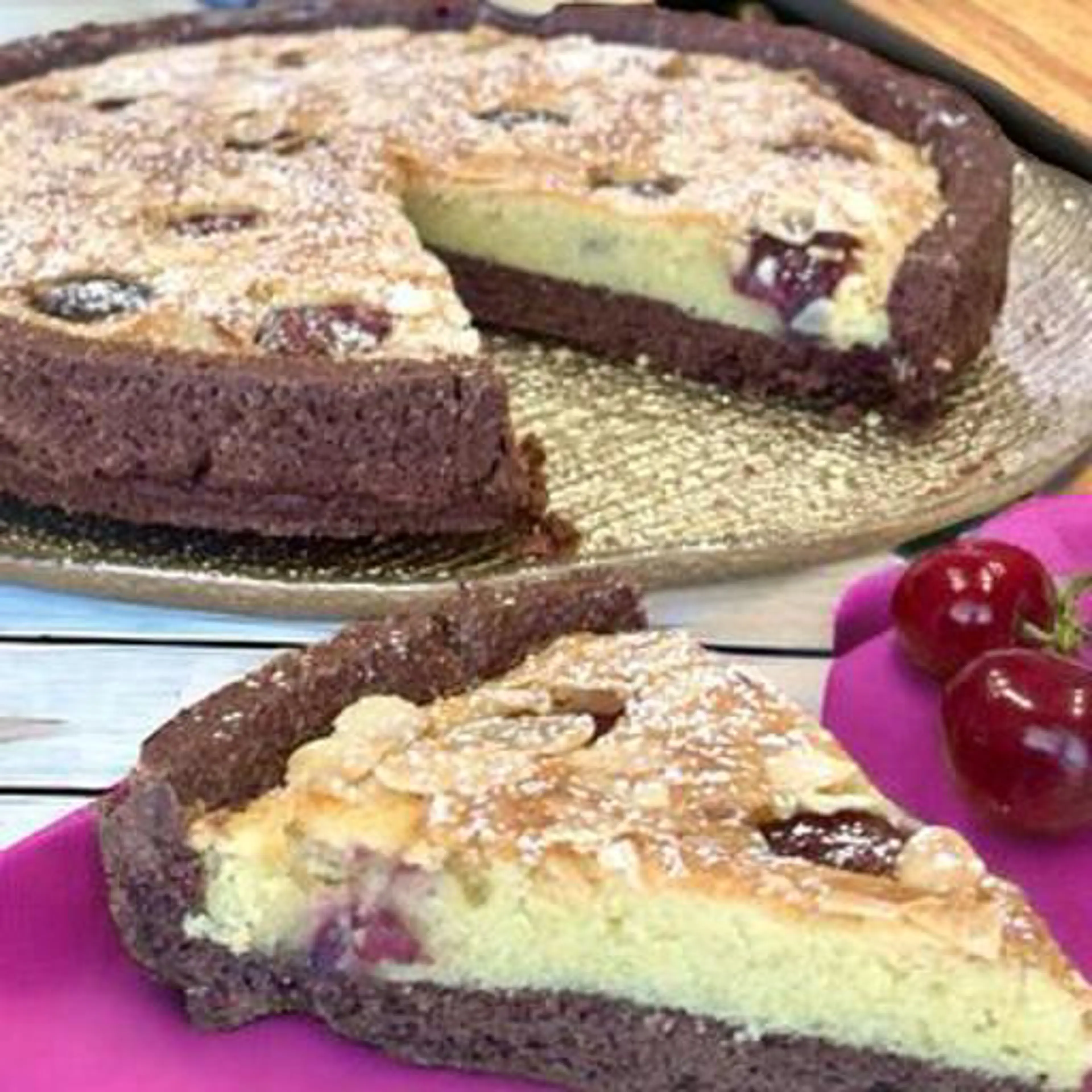 Cocoa tart with frangipane and cherries