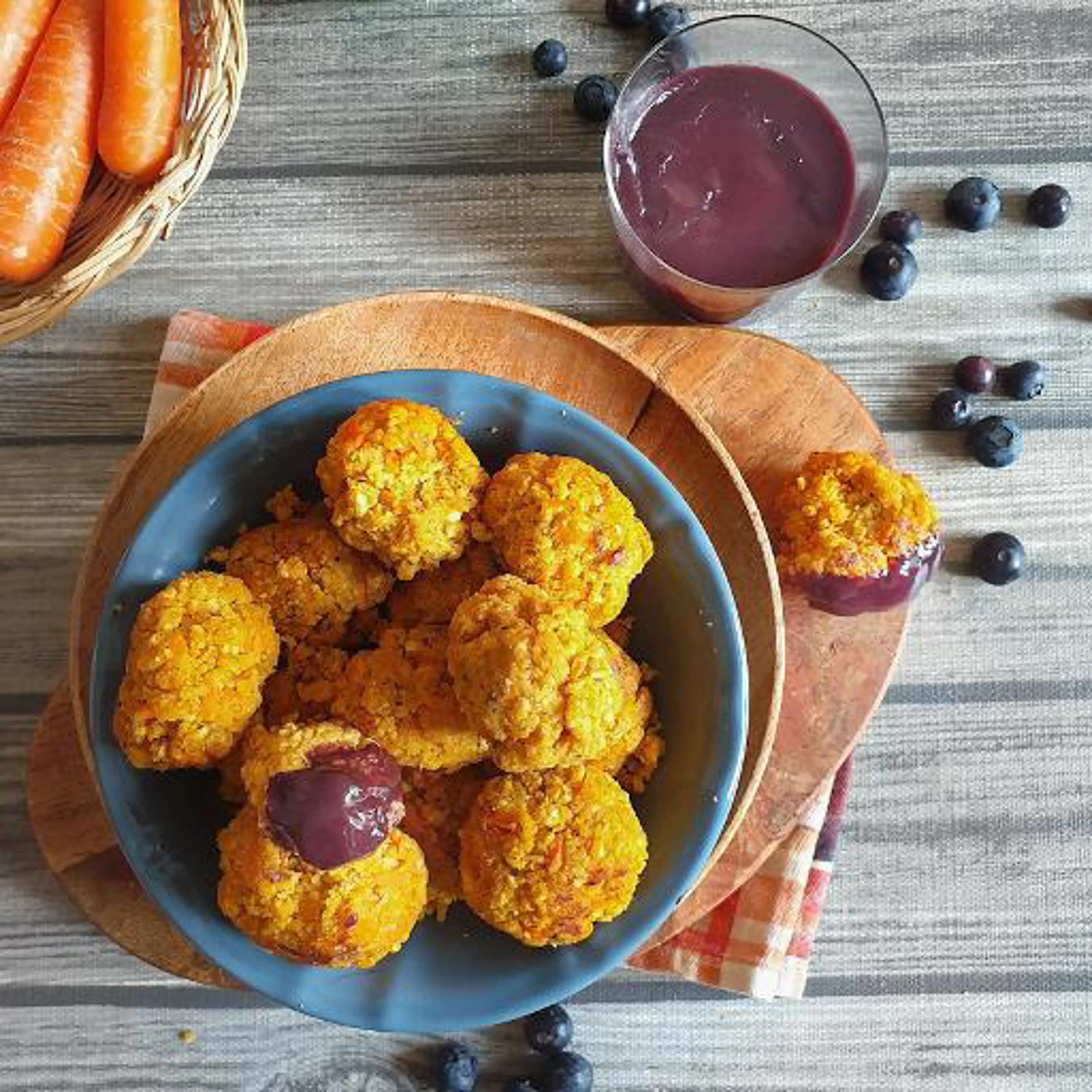Legume and grain meatballs with blueberry béchamel