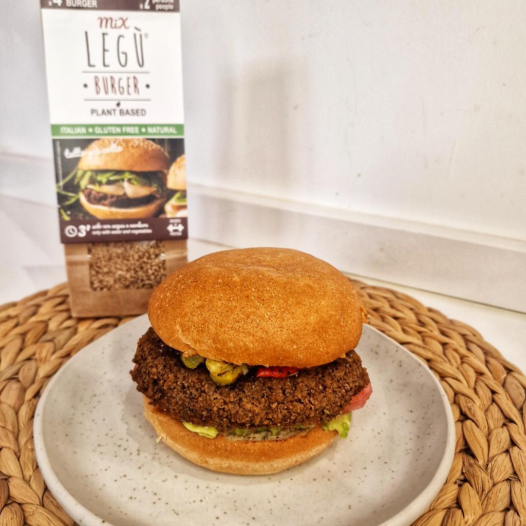 Gluten-free sandwich with veggie burger and avocado sauce