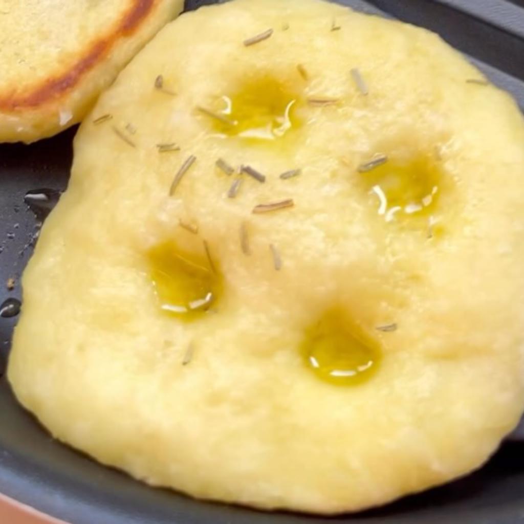 Potato fritters cooked in a pan