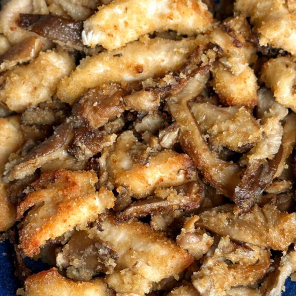 Émincés de poulet et champignons gratinés