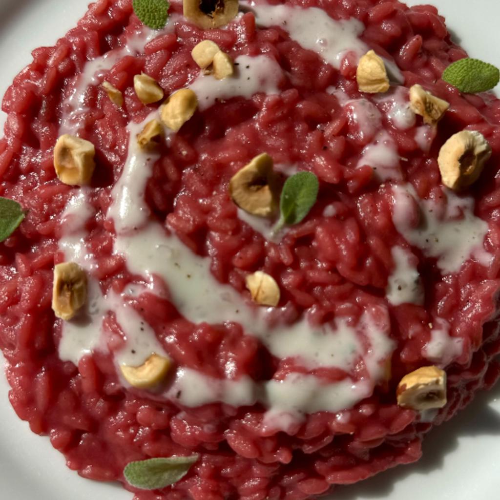 Risotto with beetroot cream, gorgonzola and hazelnuts