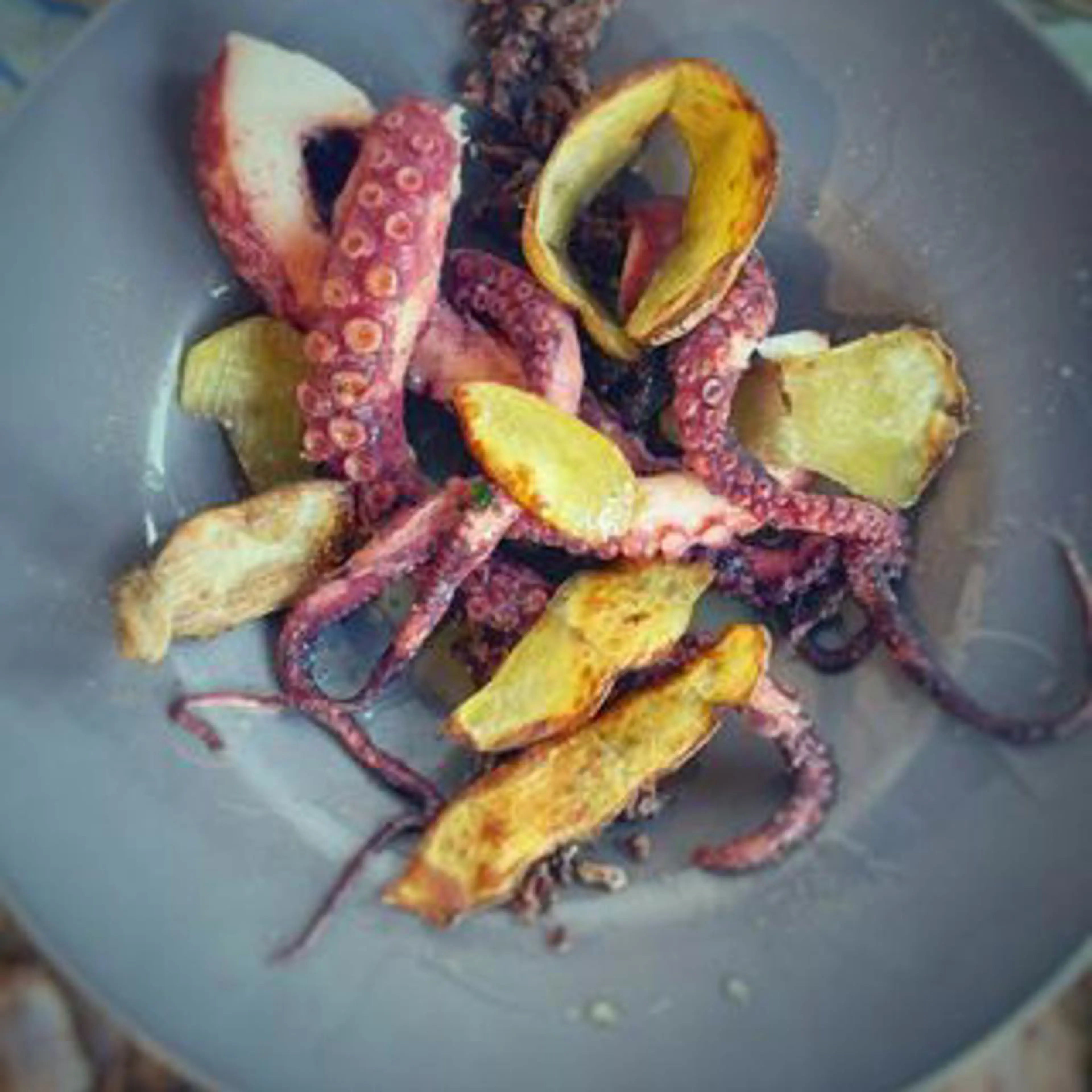 Sous-vide octopus and potatoes