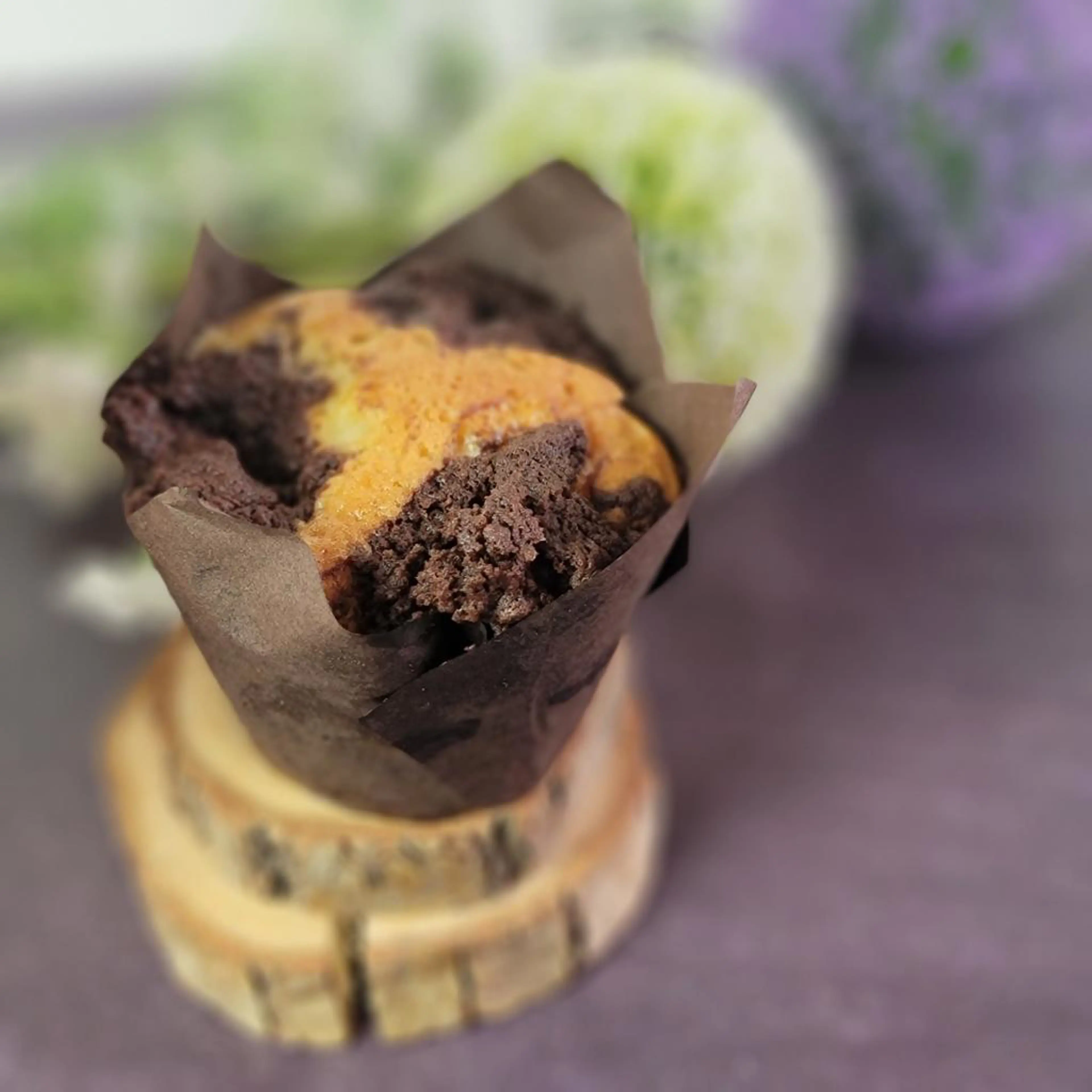 Muffin de cítricos e crumble de cacau