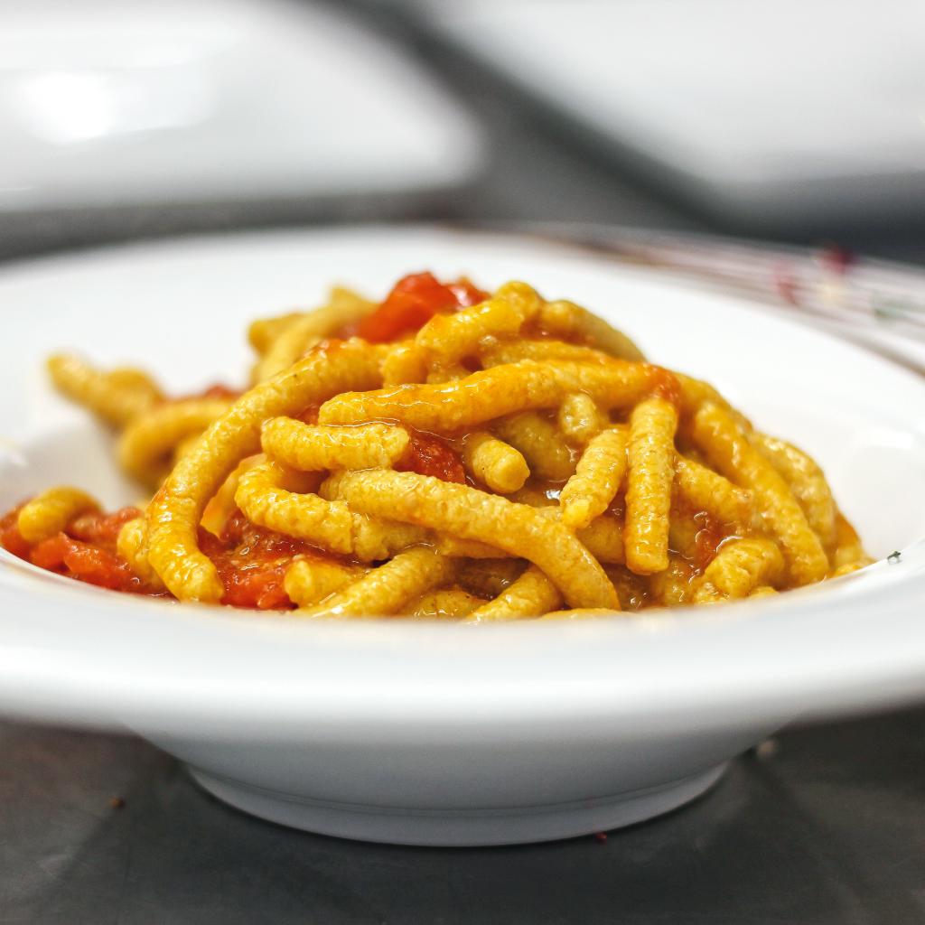 Passatelli di romagna in salsa di pomodoro e parmigiano reggiano 60 mesi