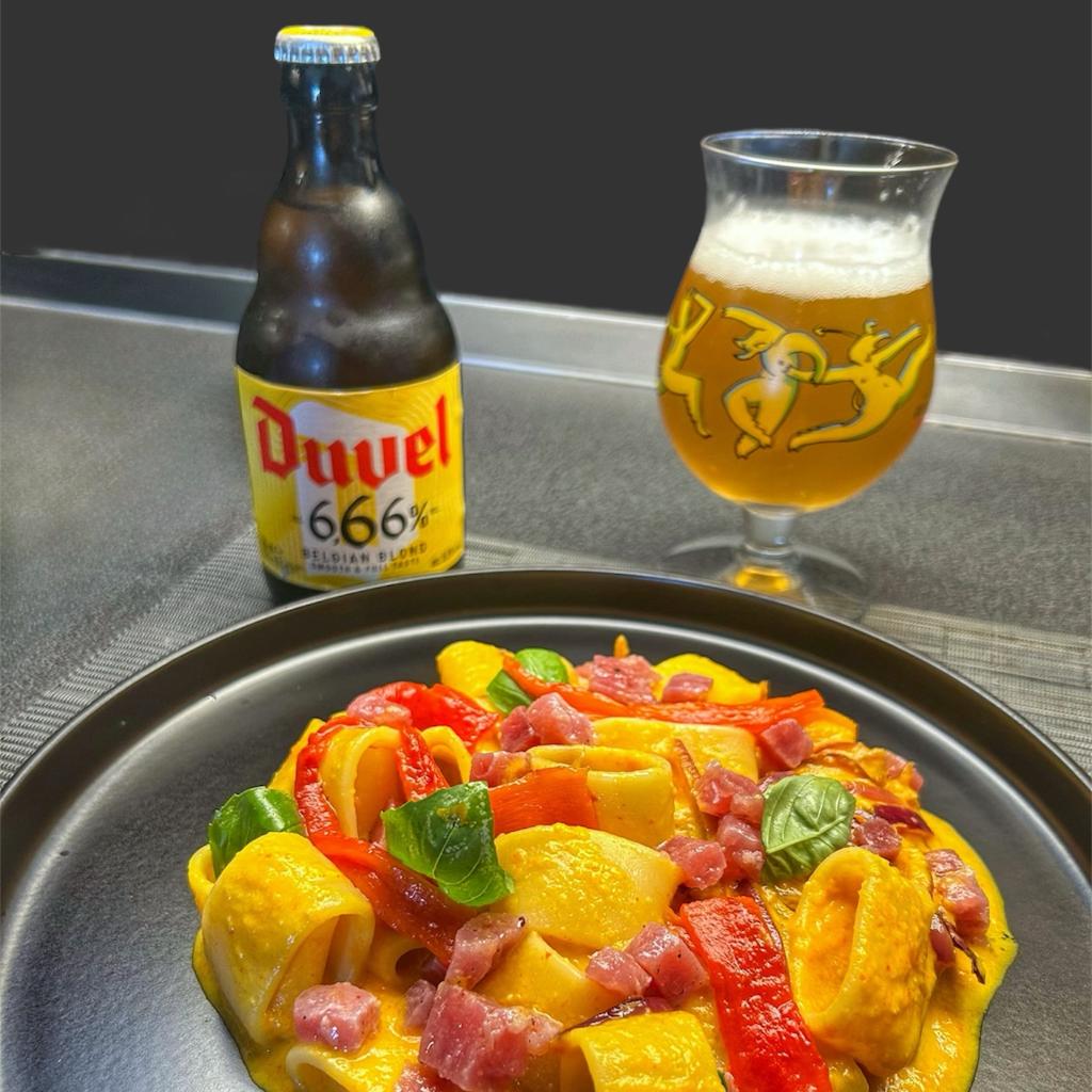 Calamarata met geroosterde paprikasaus, gekarameliseerde uien en tartaar van rode tonijn
