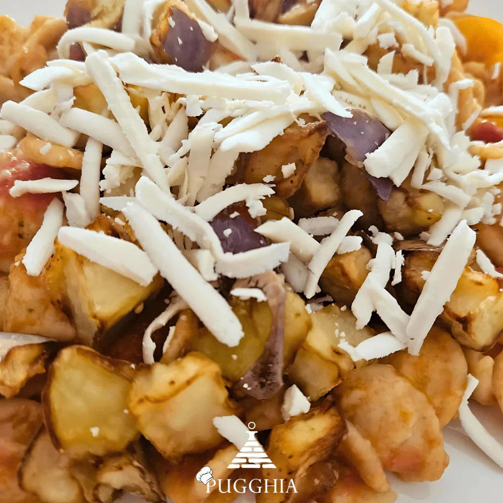 Orecchiette pugliesi con pomodorini, melanzane e ricotta