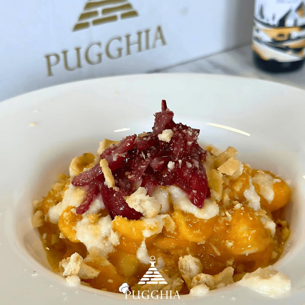 Orecchiette with pumpkin cream, caramelized onions and taralli