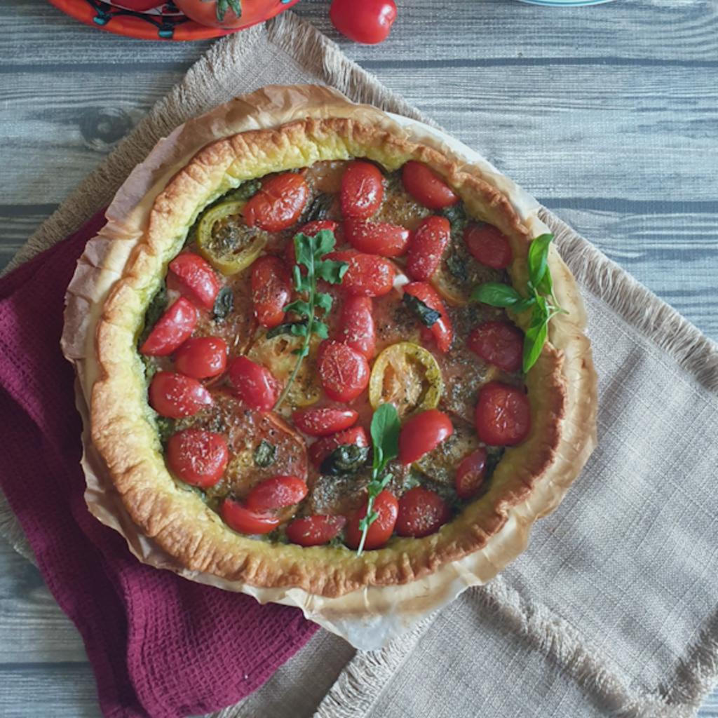 Galette with arugula pesto and tomatoes