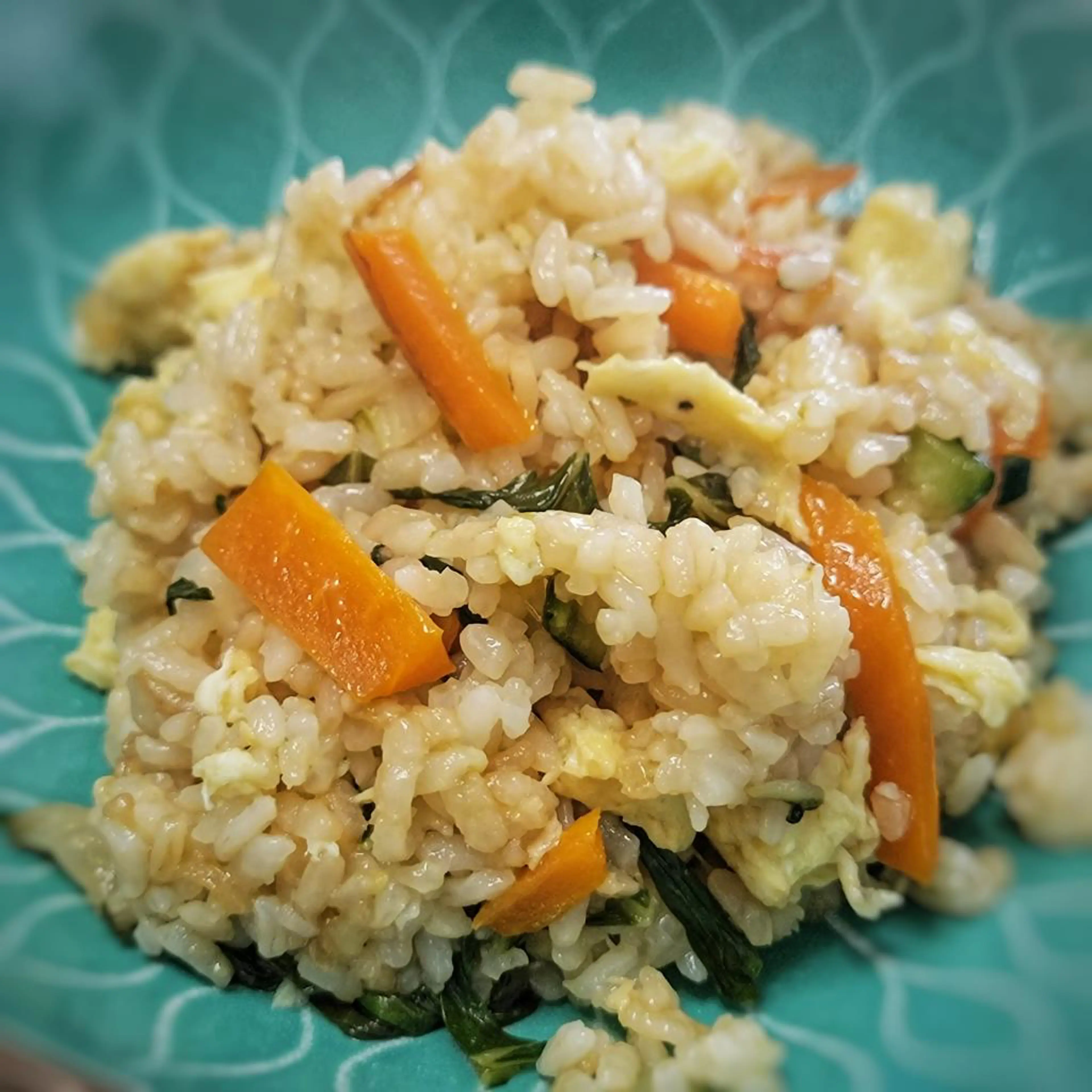 Rice and stir-fried pak choy with carrots and zucchini (Asian style)