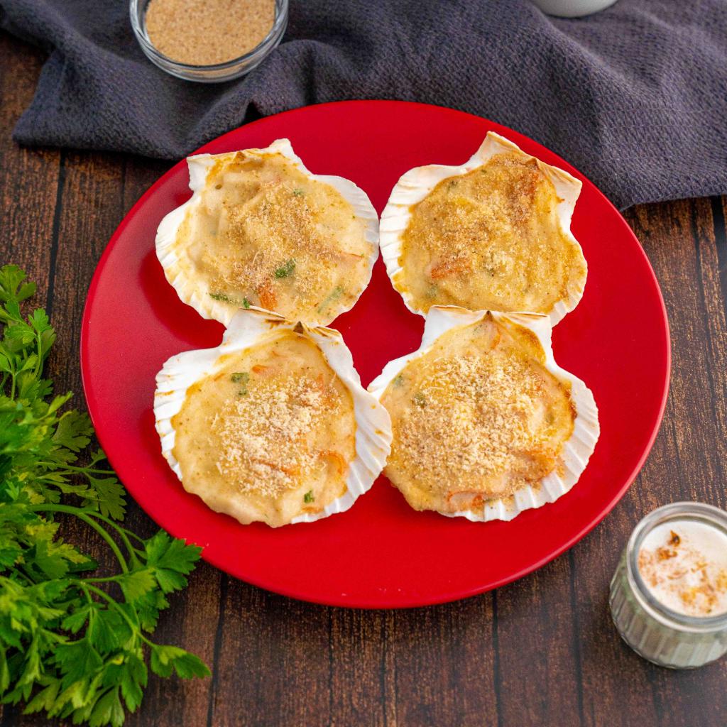 Capesante gratinate di bastoncini di mare