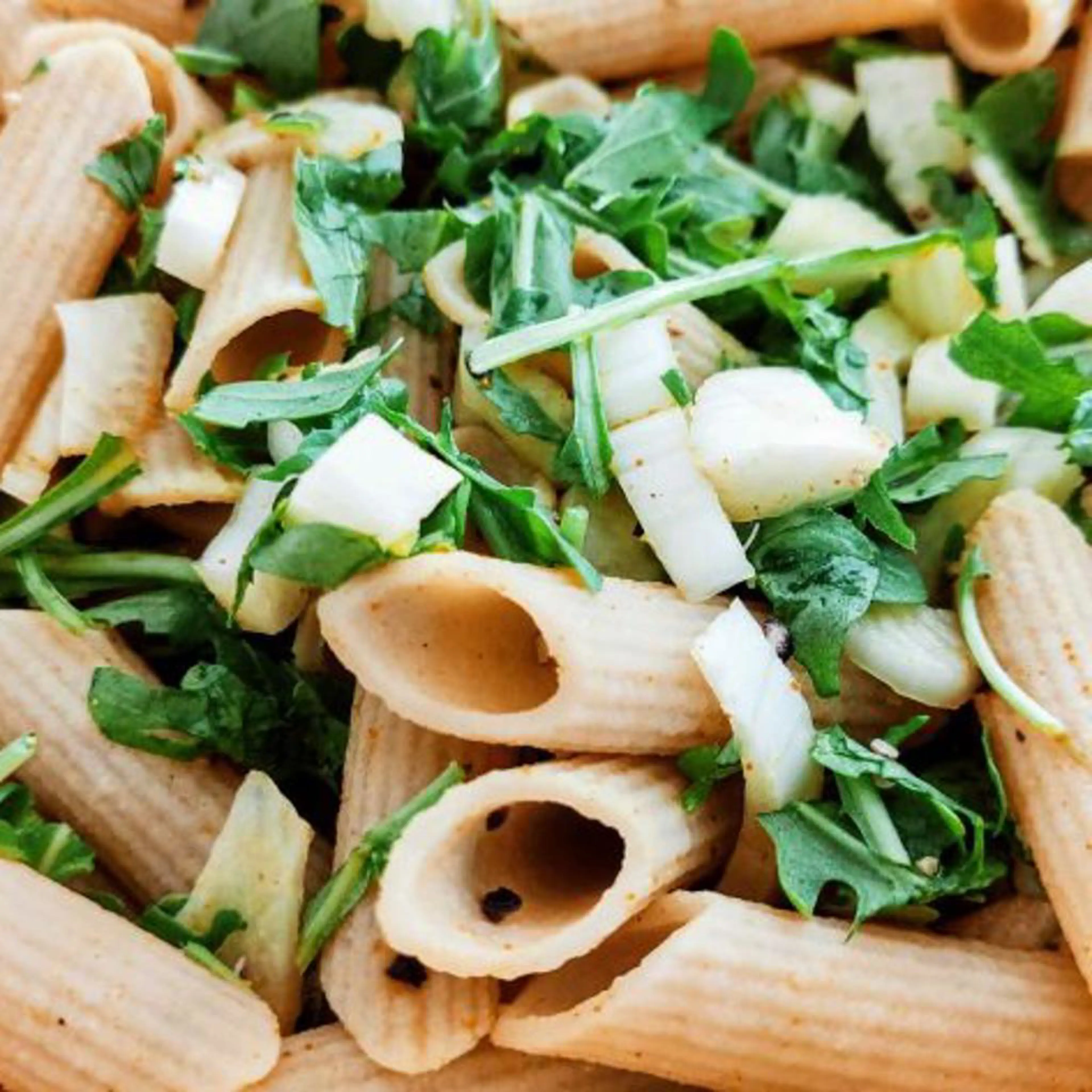 Cold pasta with turmeric, arugula, and fennel