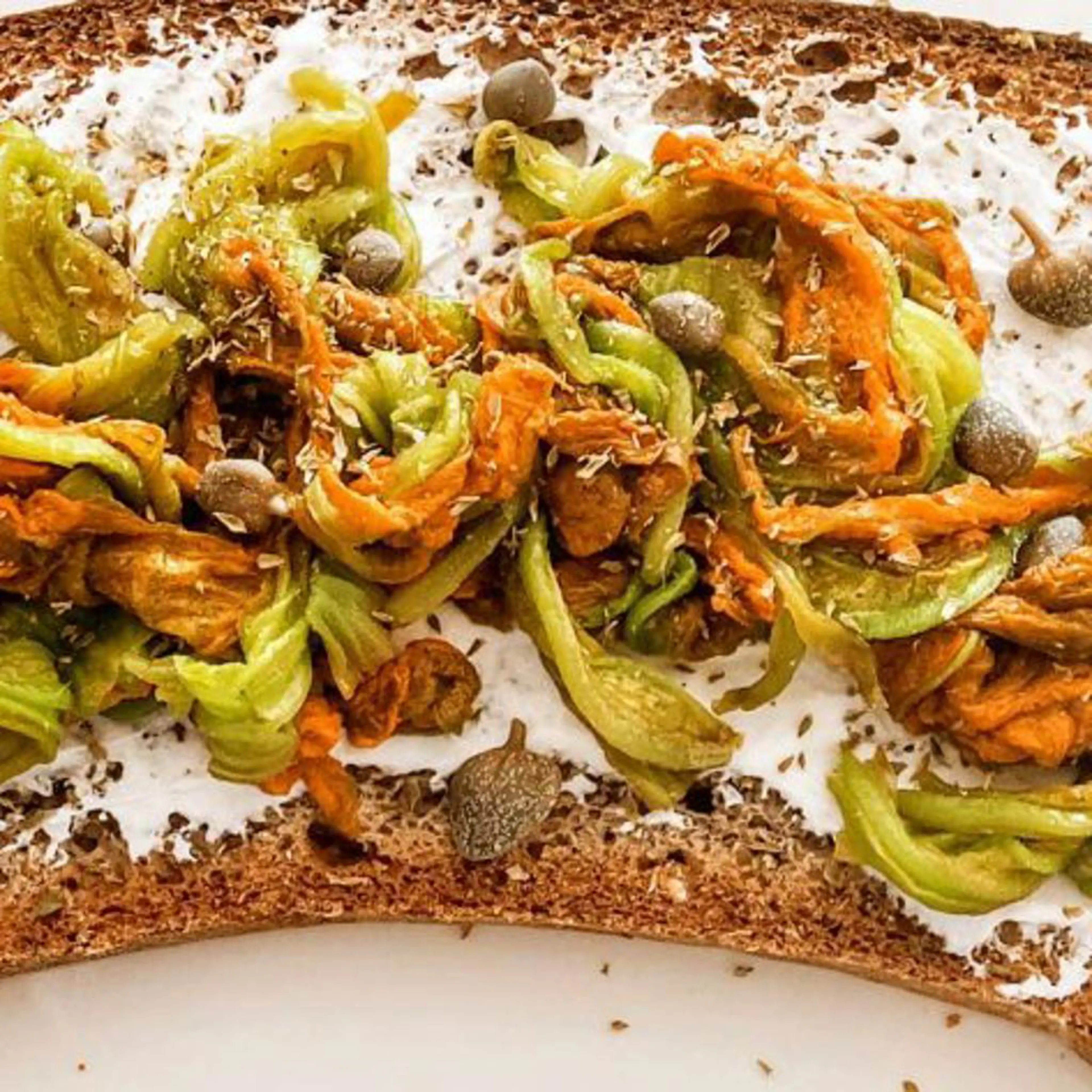 Toast with ricotta and zucchini flowers