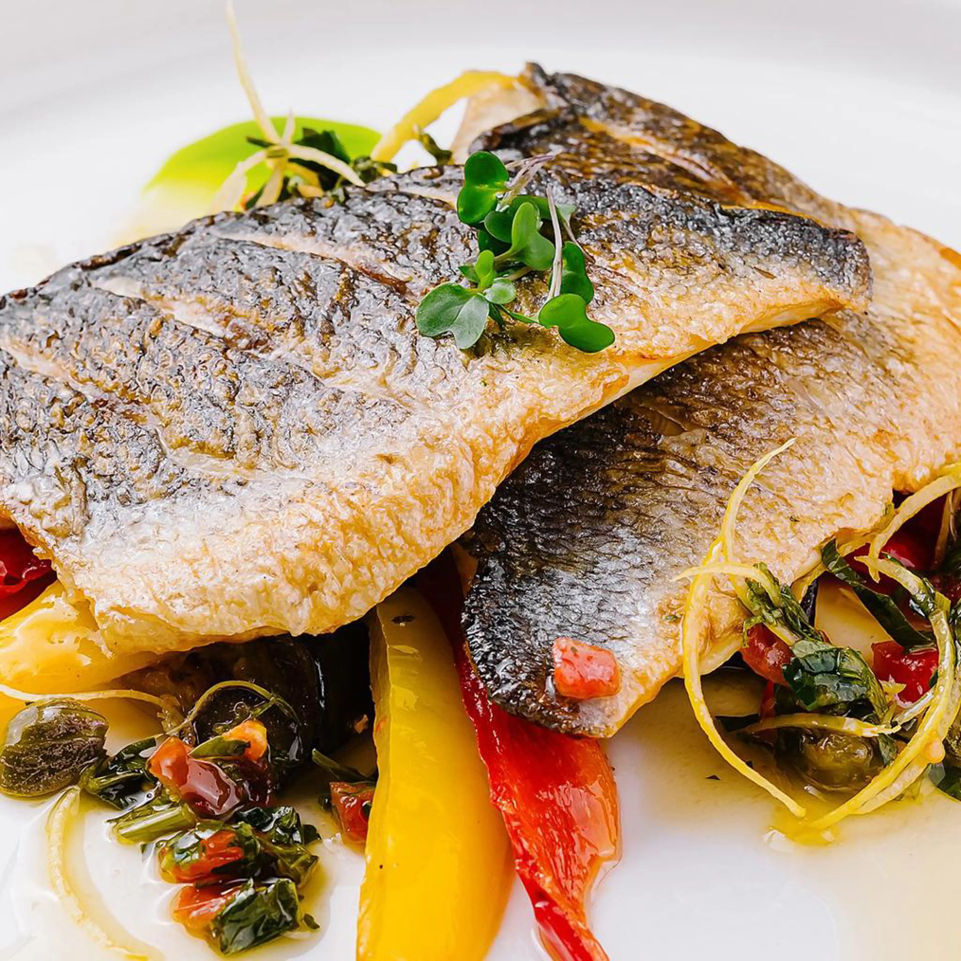 Filetto di spigola con peperoni